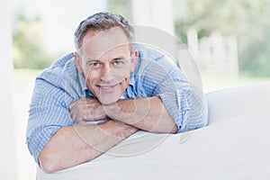 Happy man relaxing on the couch