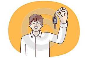 Happy man showing off car keys after getting loan or leasing to buy new car at bargain price