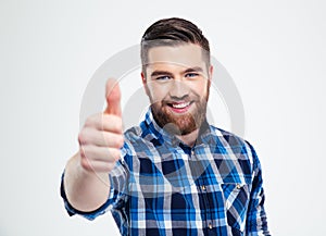 Happy man showing thumb up