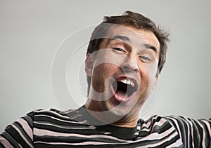 Happy man singing or shouting