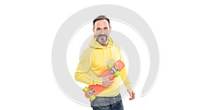 happy man skateboarder with beard hold penny skateboard isolated on white, hipster lifestyle.