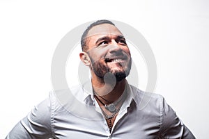 Happy man smiling. isolated on white. confidence charisma. beard care of unshaven man. macho man in white shirt. sexy