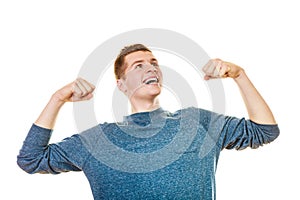 Happy man successful lad with arms up