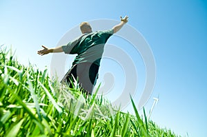 Happy man on the summer field