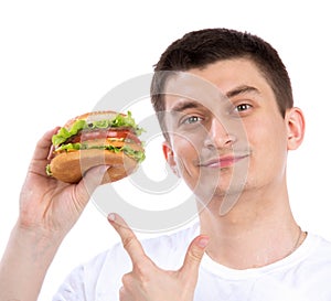 Happy man with tasty fast food unhealthy burger sandwich