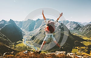 Happy Man traveler jumping with backpack