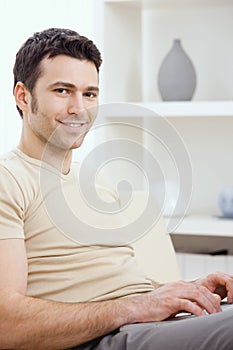 Happy man using computer