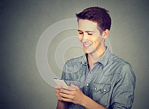 Happy man using mobile phone