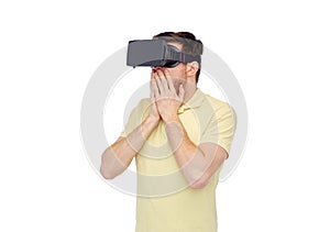 Happy man in virtual reality headset or 3d glasses