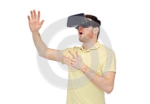 Happy man in virtual reality headset or 3d glasses