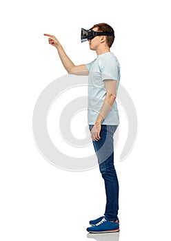 Happy man in virtual reality headset or 3d glasses