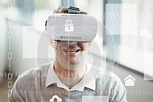 Happy man in VR headset standing behind interfaces