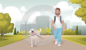 Happy man walks in the city park with his dog. Walking with a pet in nature. Outdoor activities with a four legged friend