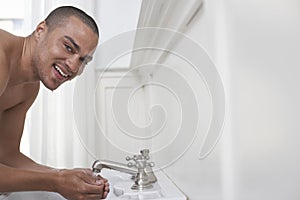 Happy Man Washing Face