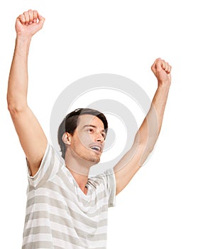 Happy man, winner and hand up for success in competition, celebration and white background in studio. Positive person