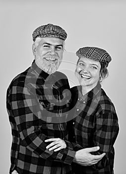 happy man and woman checkered shirt and hat. Happy family concept. hippie and hipster. couple vintage fashion. follow
