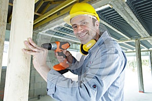 happy man working as handyman