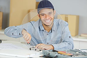 happy man works as technician