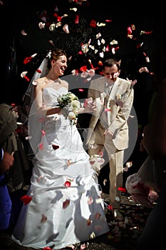 Happy marriage with rose petals.