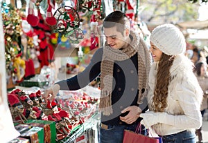 Happy married couple at Catalan Christmas market