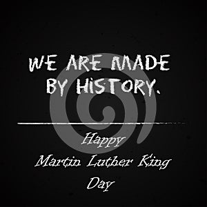 Happy Martin Luther King Day free typography greeting card on chalkboard background. We are made by history.