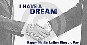Happy Martin Luther King jr day. I have a dream and white and black handshaking background