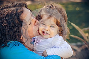 Happy mather and daughter in summer