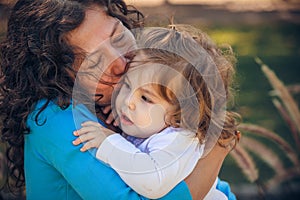 Happy mather and daughter in summer