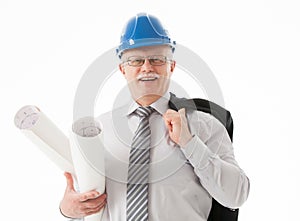 Happy mature businessman in a blue helmet holding projects
