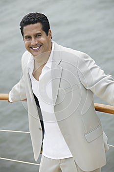 Happy Mature Businessman On The Yacht