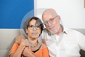 Happy mature couple in love, in their home