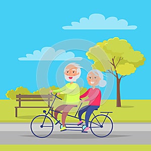 Happy Mature Couple Riding Together on Bike