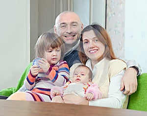 Happy mature man with wife and children