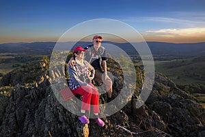 happy mature married couple traveling through the Ural mountains