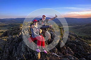 happy mature married couple traveling through the Ural mountains