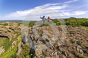 happy mature married couple traveling through the Ural mountains