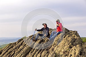 happy mature married couple traveling through the Ural mountains