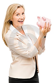 Happy Mature woman holding piggy bank isolated on white background