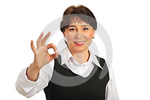 Happy mature woman show okay sign