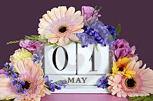 Happy May Day calendar with flowers.