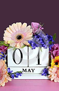 Happy May Day calendar with flowers.