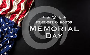 Happy memorial day concept made from american flag with text on black wooden background