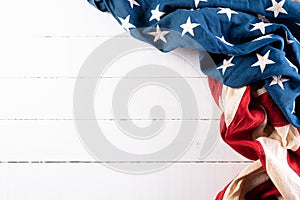 Happy Memorial Day, May 25. American flags against white wooden background. Flat lay with copy space