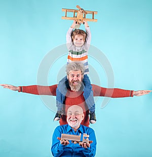 Happy men family traveling. Family grandfather father and son dream about travel. Summer holiday and vacation concept