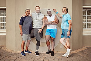 Happy men, fitness portrait and group exercise on wall background in urban city. Smile, sports training and male friends