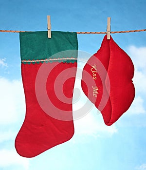 Happy Merry X mas Hanging christmas decoration hart and santa socks.