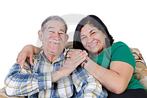 Happy Mexican senior with smiling daughter