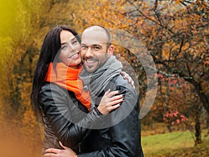 Happy middle-aged couple on autumn day