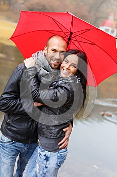 Happy middle-aged couple on autumn day