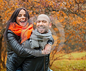 Happy middle-aged couple on autumn day